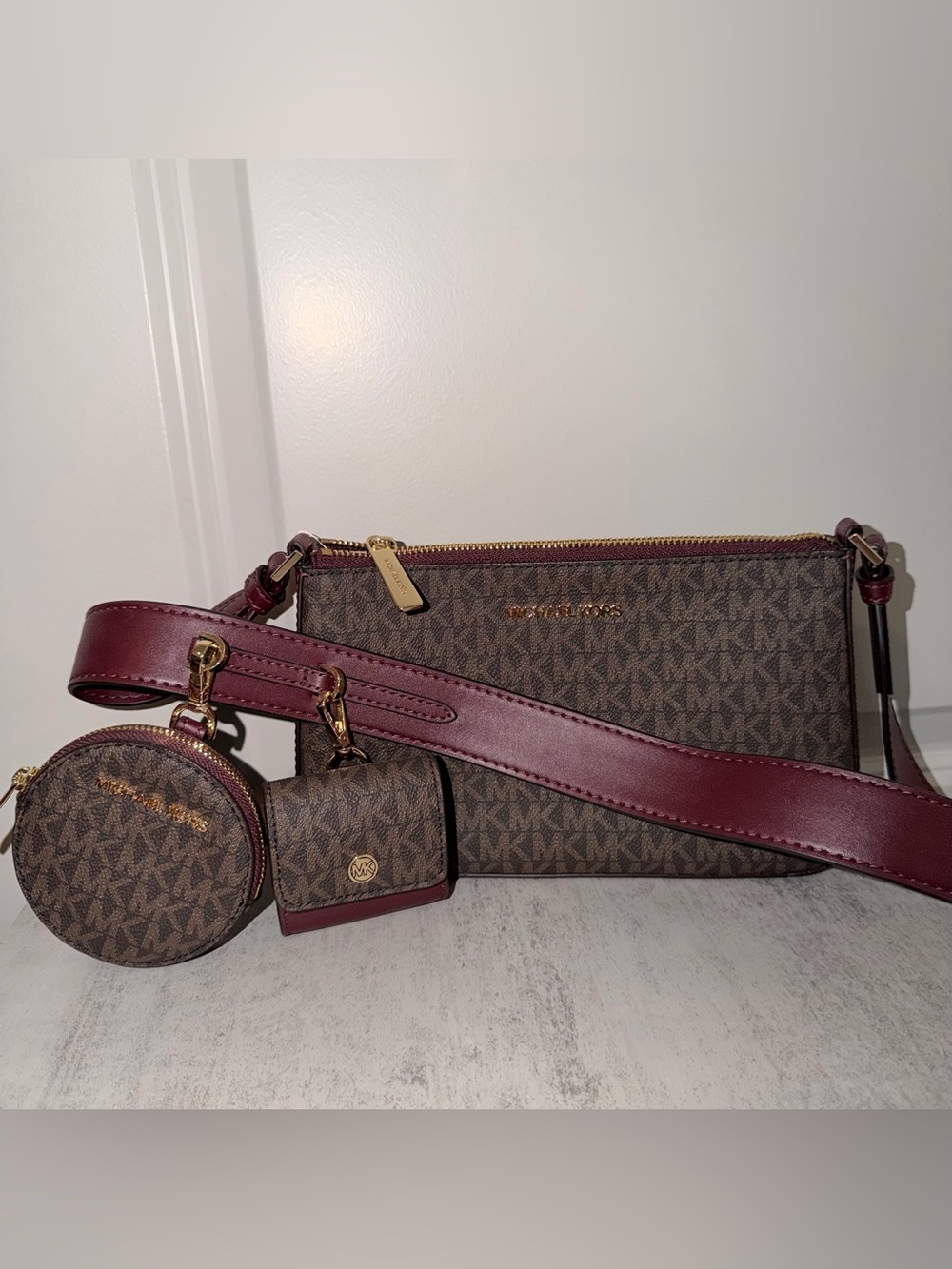 Michael Kors Jet Set Travel crossbody bag set in Merlot/signature MK logo print